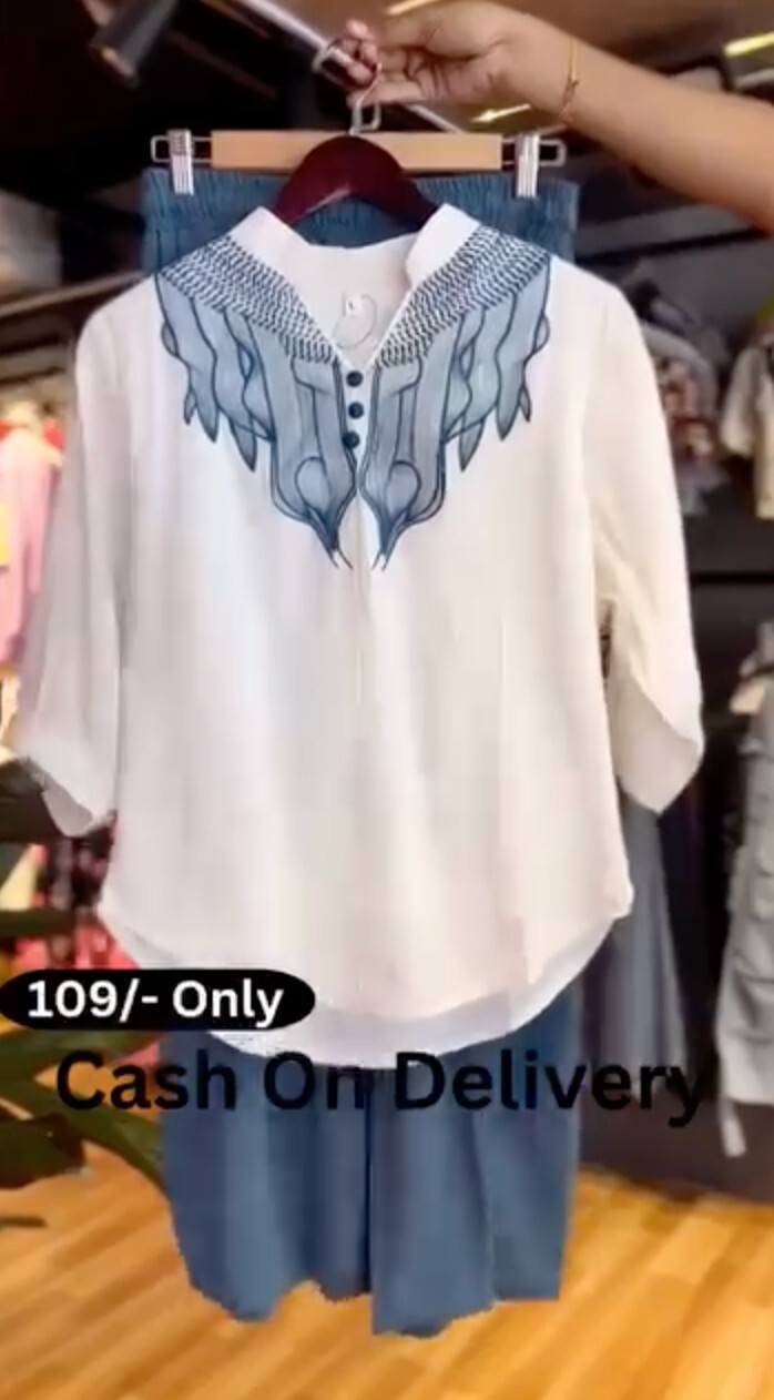 White Embroidered Tunic and Blue Pants