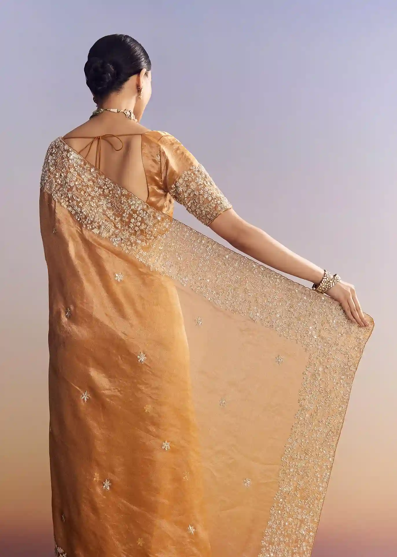 Imperial Gold-Orange Tissue Saree with Heavy Embroidered Border – Elite Trade & Trend Edition - Image 3