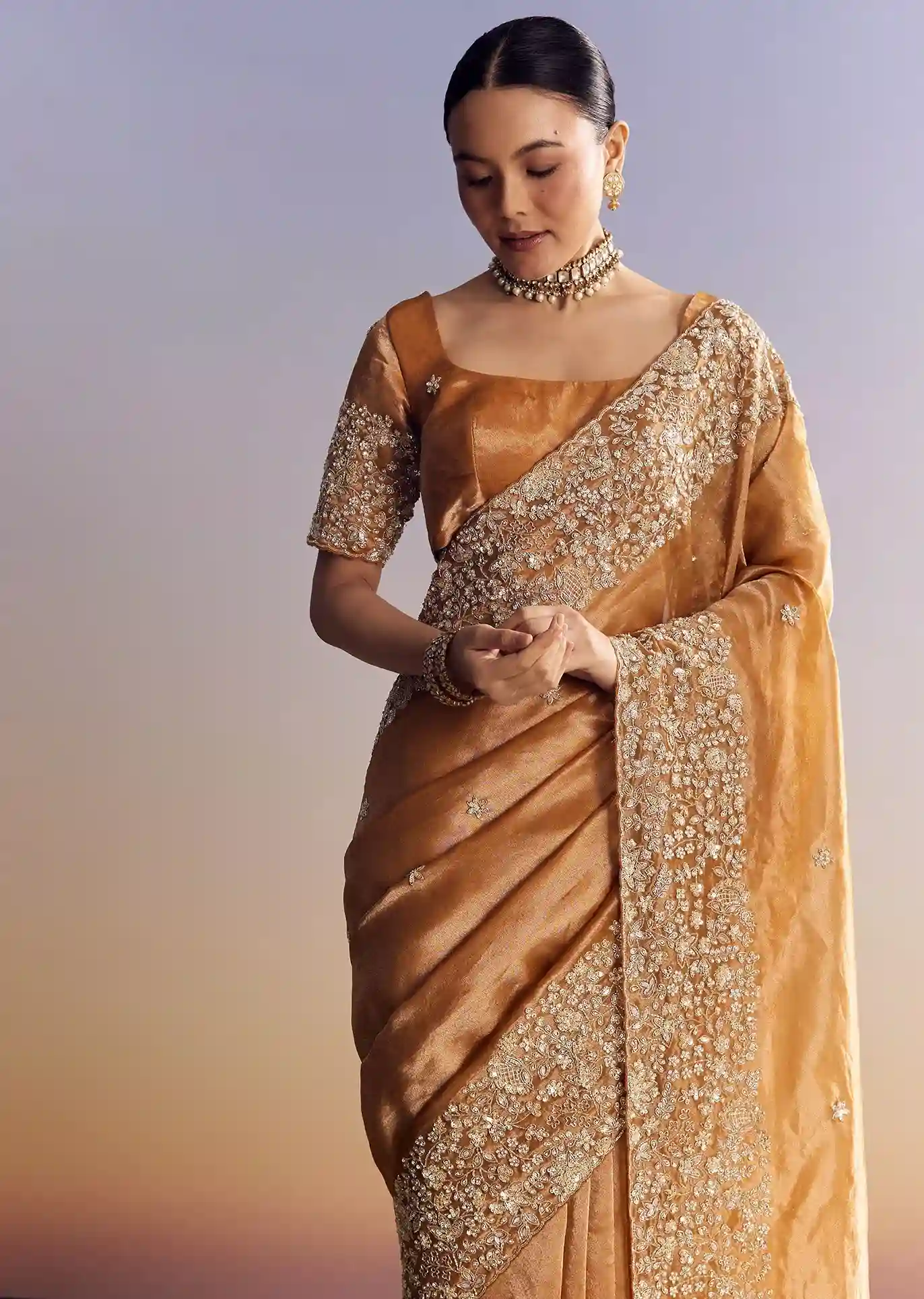 Imperial Gold-Orange Tissue Saree with Heavy Embroidered Border – Elite Trade & Trend Edition - Image 4