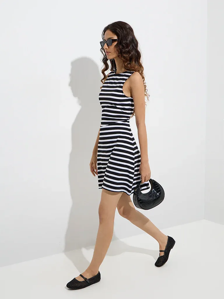 Black & White Stripe Sleeveless Mini Dress – Parisian Chic Meets Everyday Ease - Image 2