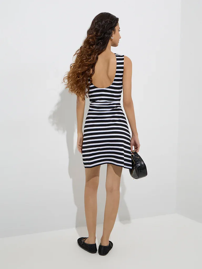 Black & White Stripe Sleeveless Mini Dress – Parisian Chic Meets Everyday Ease - Image 4