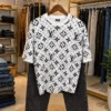 Men’s Trendy Monogram Printed Combo – White Graphic T-Shirt with Denim Jeans