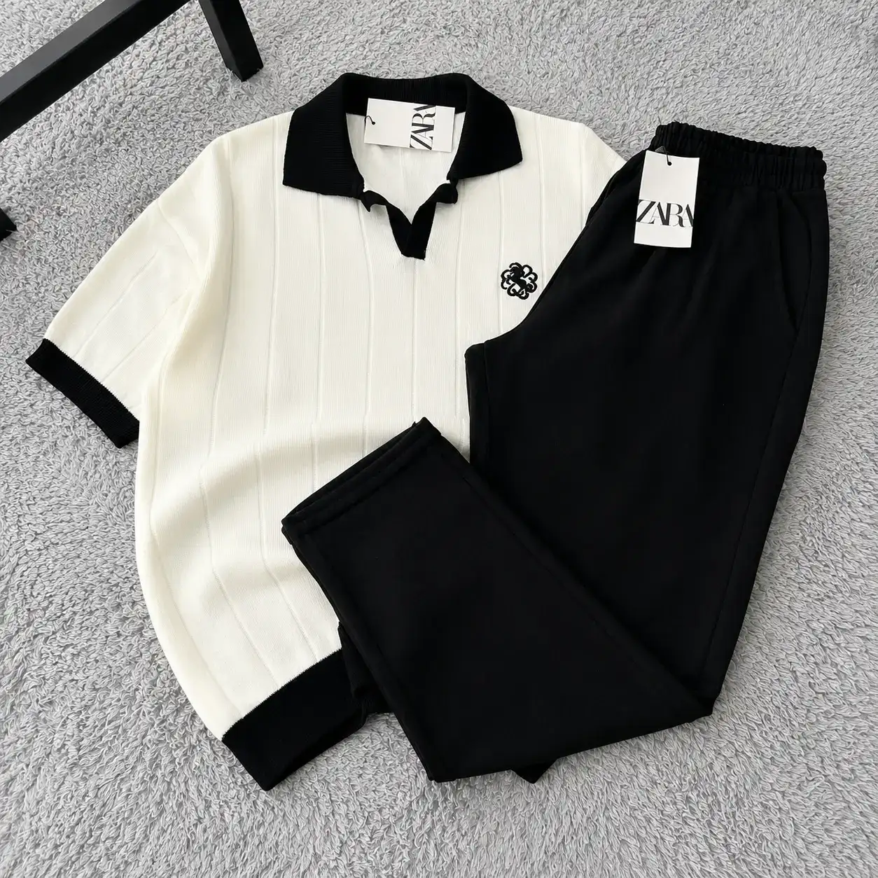 Sophisticated Dark Green Ribbed Knit Polo and Beige Trousers Set - Image 3